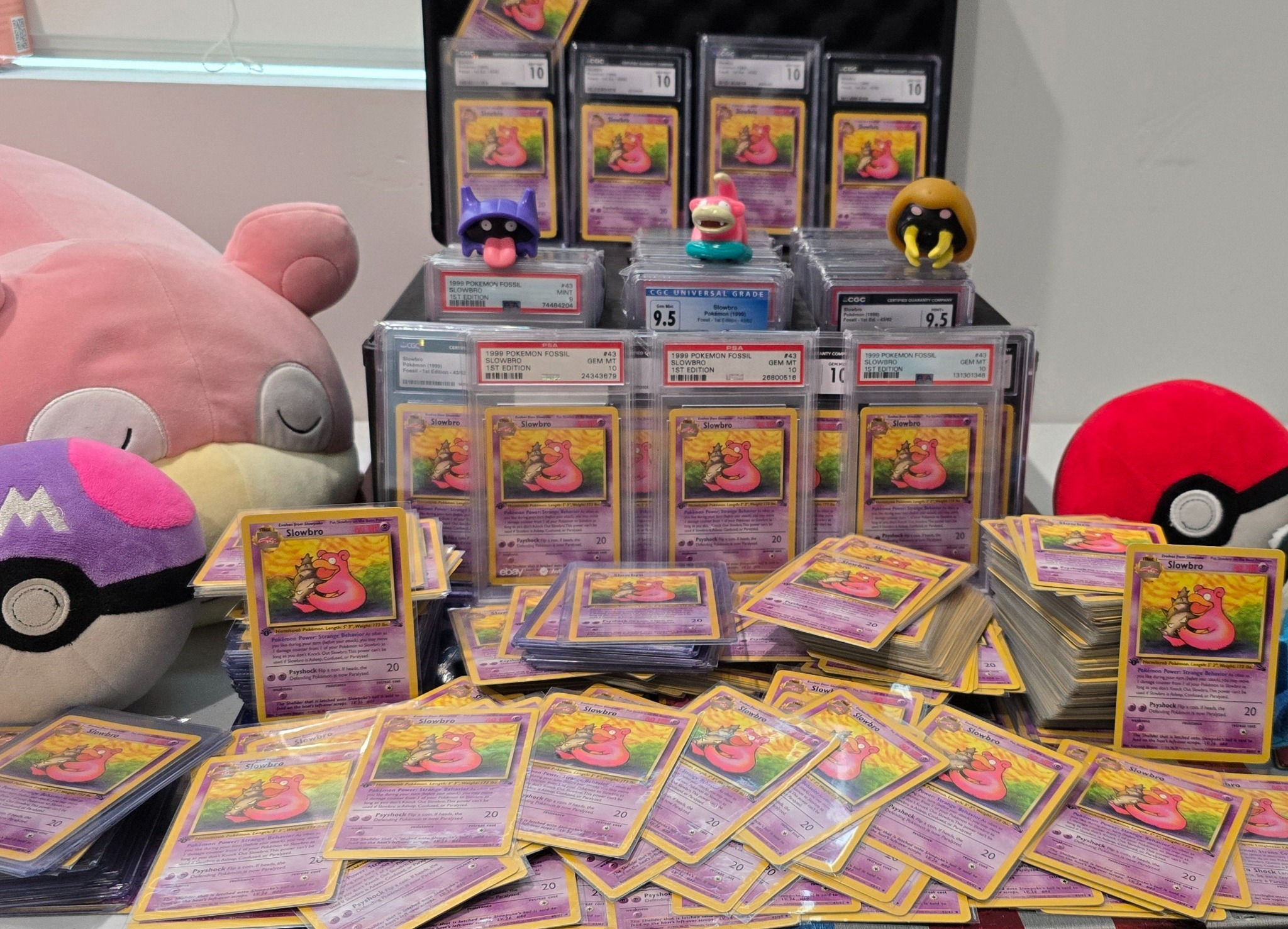 The Slowbro collection with Pokémon cards, plush toys and figures